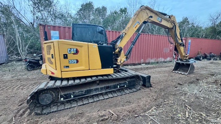 Caterpillar 309 CR mini excavator on job site